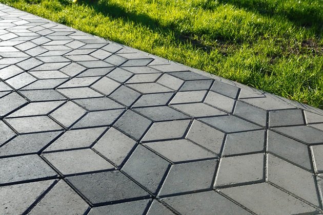 Unique custom patterned stamped concrete courtyard with geometric designs